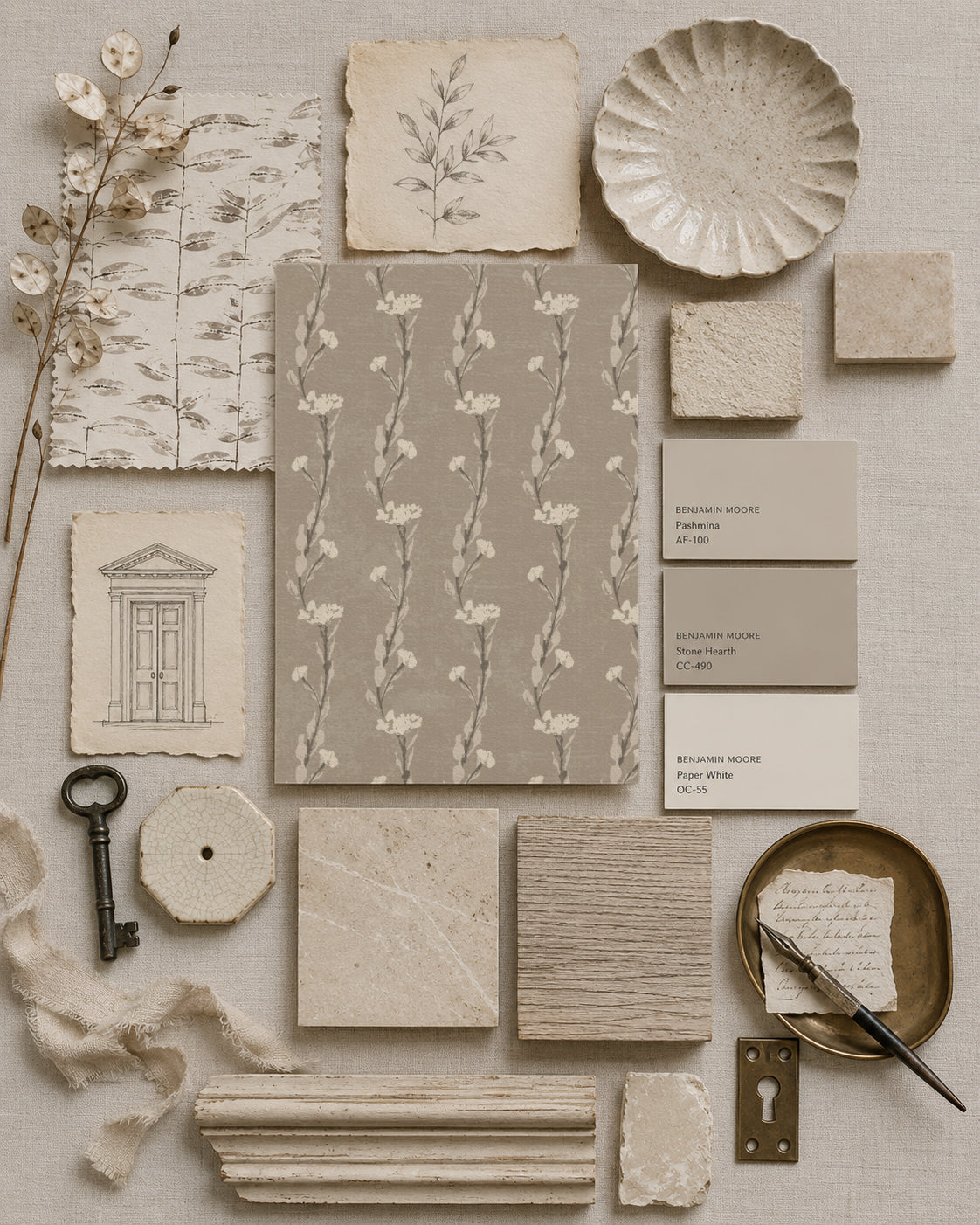 Taupe vine wallpaper sample with vintage decor elements and neutral tones.