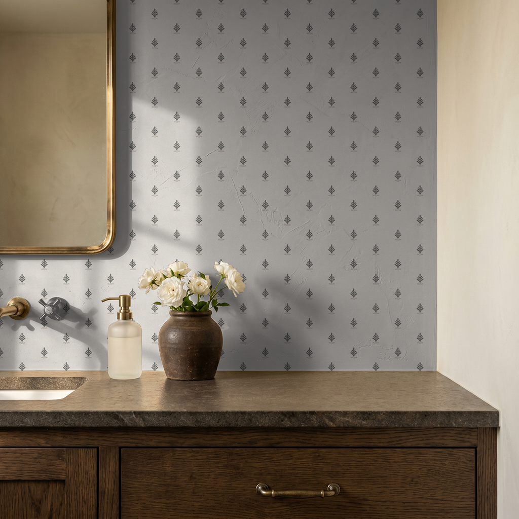 Elegant vintage block print wallpaper in charcoal and taupe with floral pattern in bathroom setting.