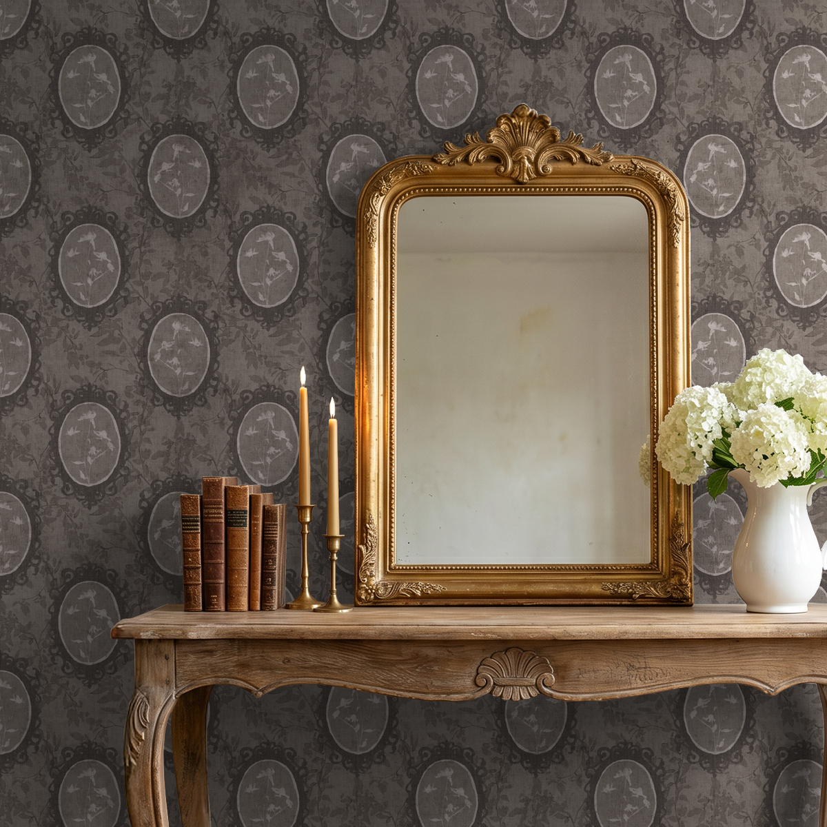 Vintage floral wallpaper with oval frames in a classic room setting with mirror and candles.