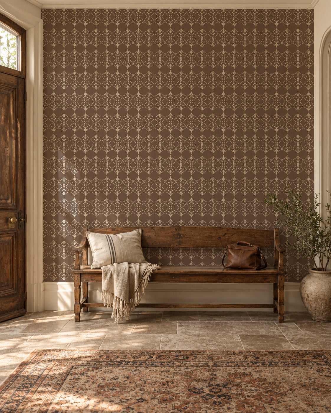 Vintage ornamental trellis mocha wallpaper in elegant entryway with bench.