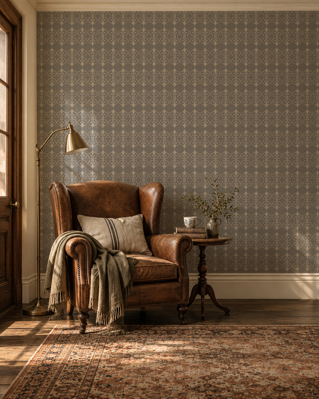 Vintage ornamental trellis wallpaper in soft grey and cream in cozy living room.
